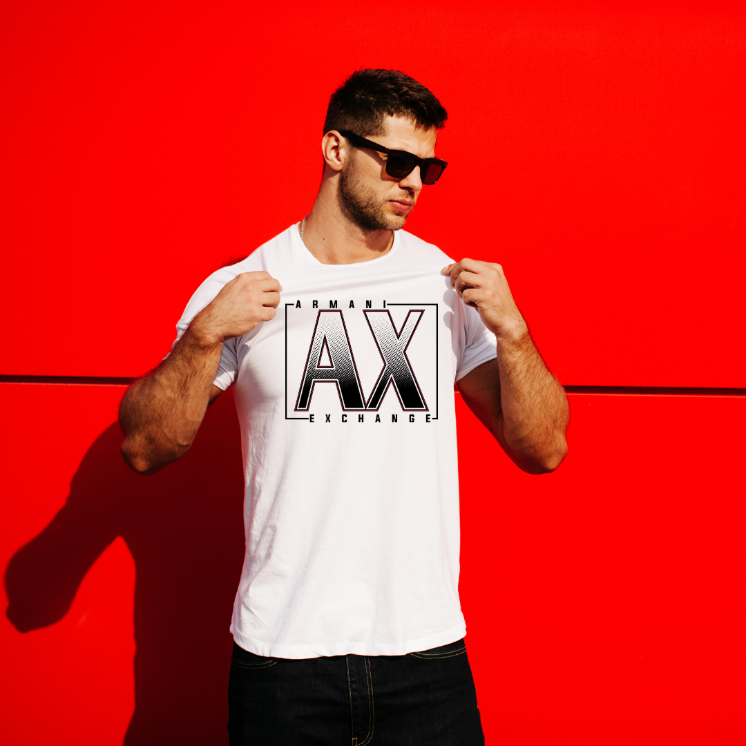 Man wearing a white t-shirt with 'AX' logo against a red background