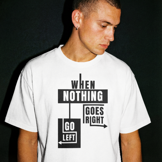 Man wearing a white t-shirt with motivational text design on a black background