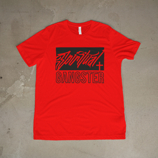 Red t-shirt with 'Spiritual Gangster' logo on a concrete floor
