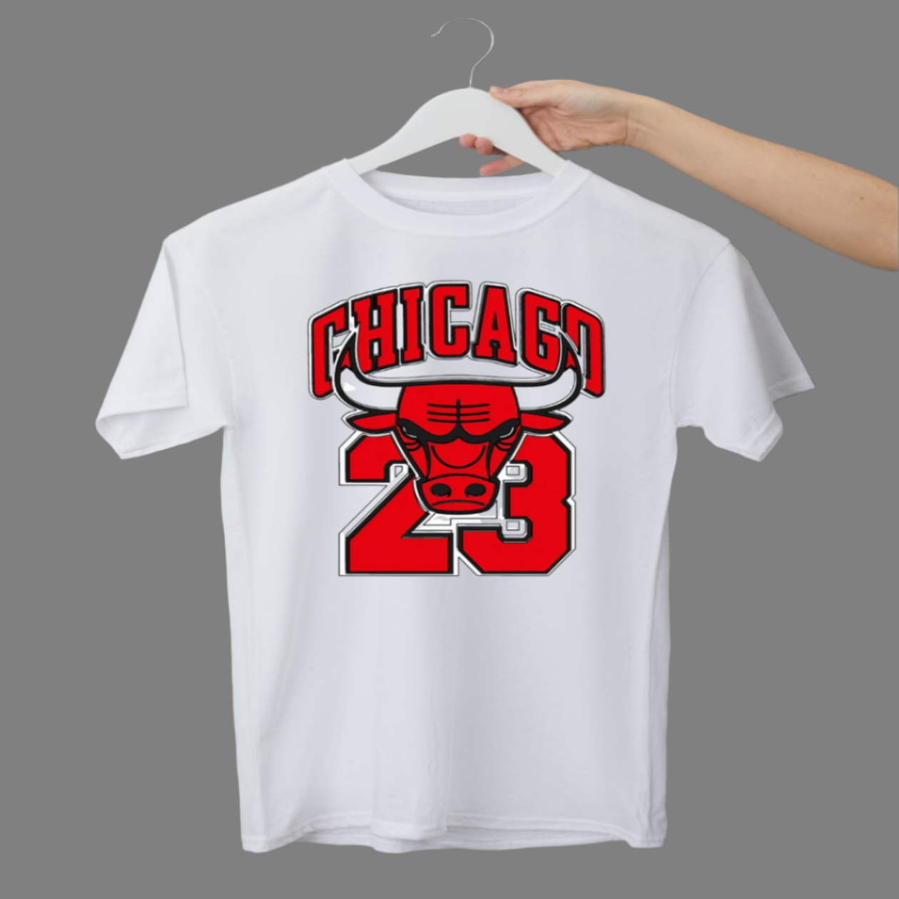White t-shirt with red and black graphic design on a hanger against a gray background