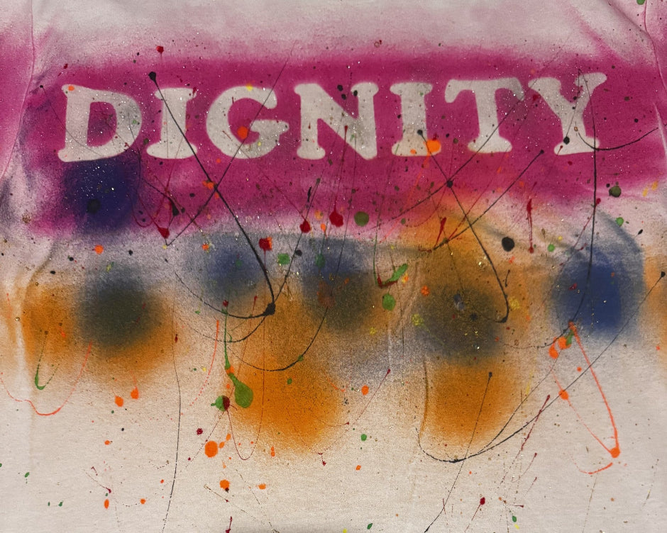 Abstract artwork with the word 'DIGNITY' in white letters on a multicolored background.