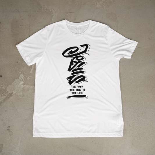White t-shirt with black graphic design on a textured surface