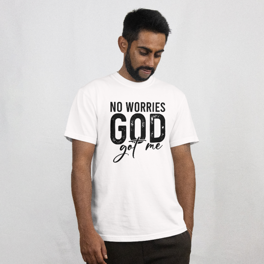 Man wearing a white t-shirt with 'No Worries God Got Me' text on a plain background