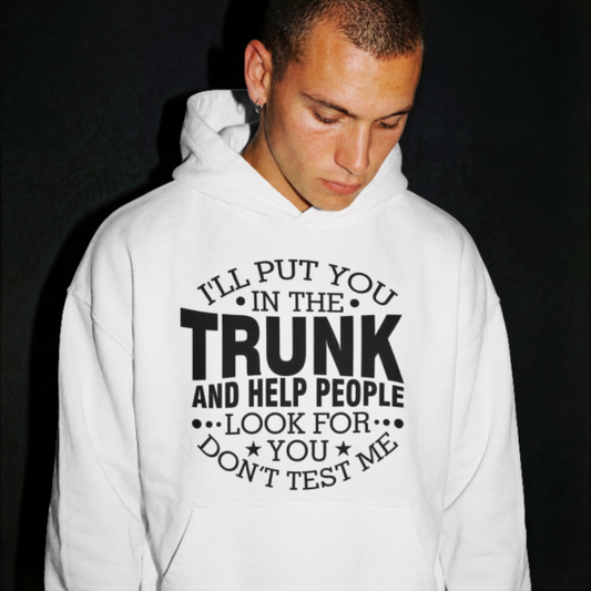 Person wearing a white hoodie with a humorous text design on a black background