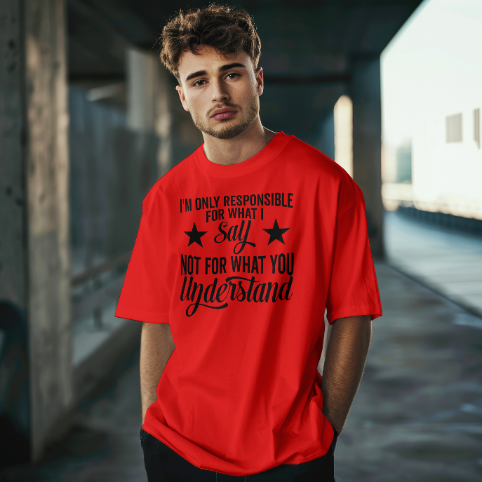 Man wearing a red t-shirt with a black text design in an urban setting