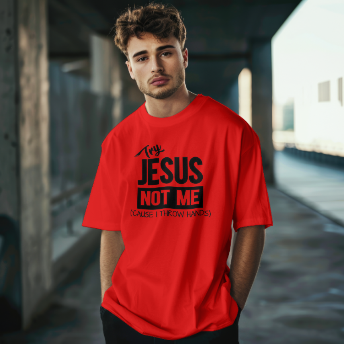 Man wearing a red t-shirt with  Try 'Jesus Not Me' text in an urban setting