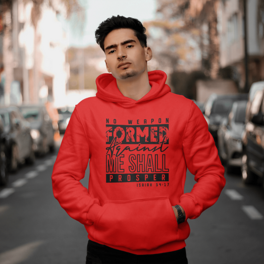 Man wearing a red hoodie with text on a city street