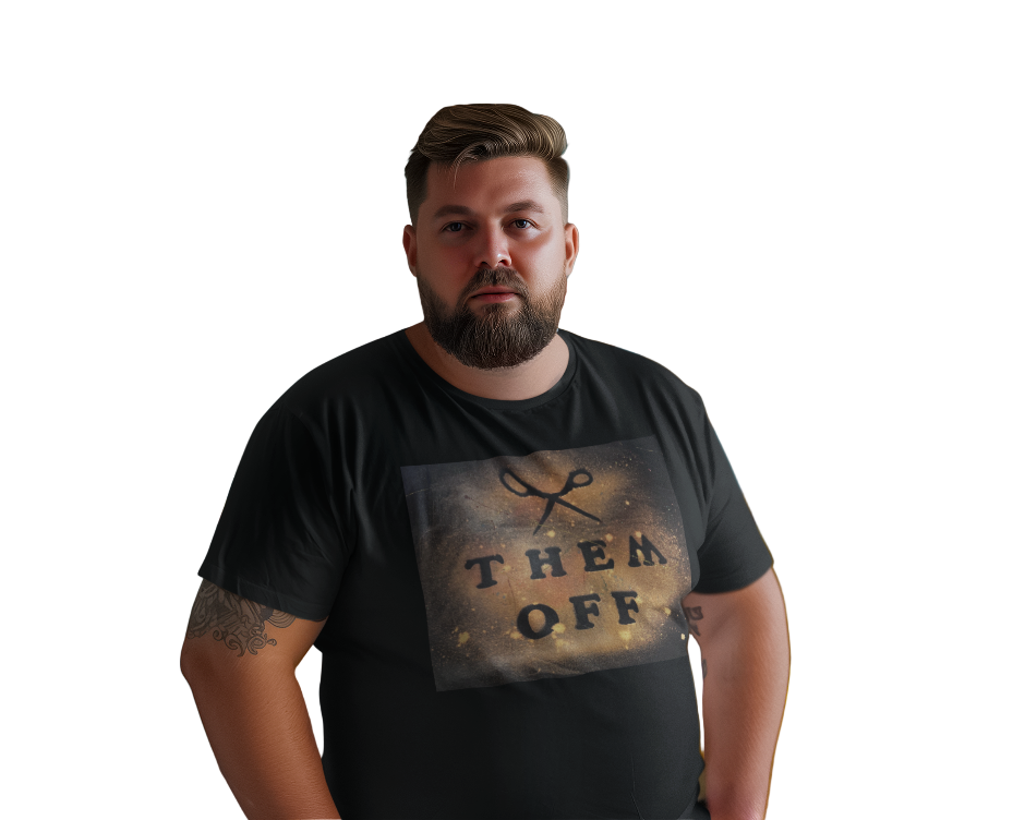 Man wearing a black t-shirt with text in a colorful room with a yellow couch and decorative items.